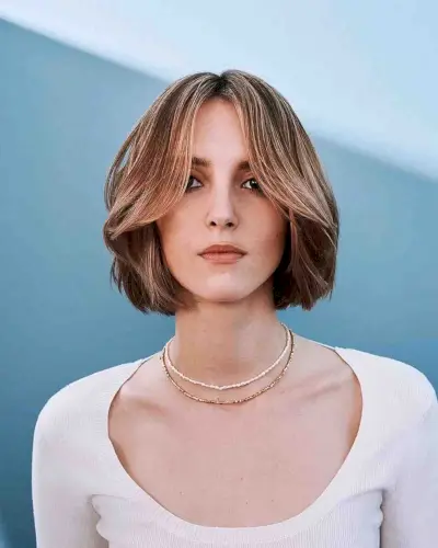 Soft Shaggy Bob with Long Curtain Fringe and a Face Frame for Straight Hair