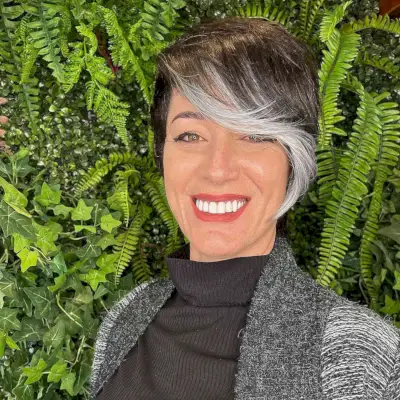 Very Long Pixie with a Bold Silver Money Piece and side Bangs