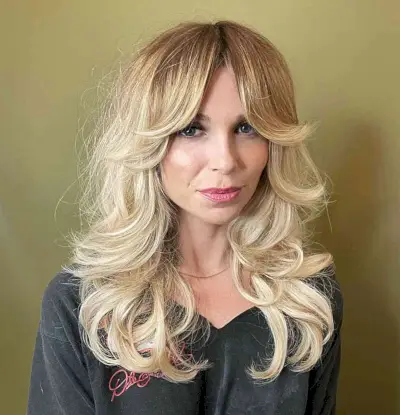Trendy Blonde Shag with Curtain Fringe and Curled Ends