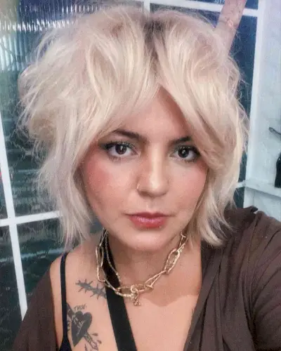 Platinum Short Fluffy Shag with Curtain Bangs