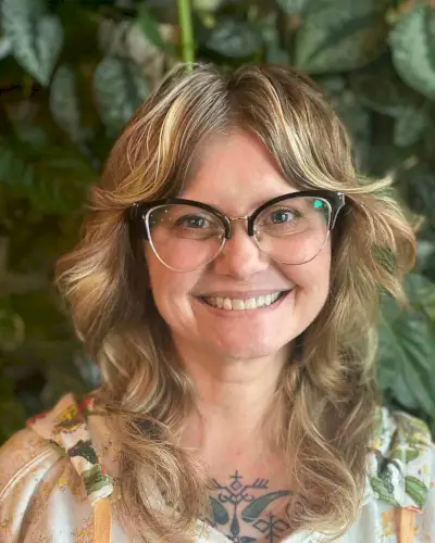 Medium Shag with Soft Curls and Curtain Bangs for Women Over 50