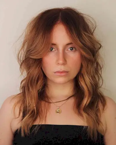 Wavy Modern Shag with a Middle Part and Bangs