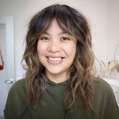 Middle-Parted Bottleneck Bangs on Mid-Length Hair