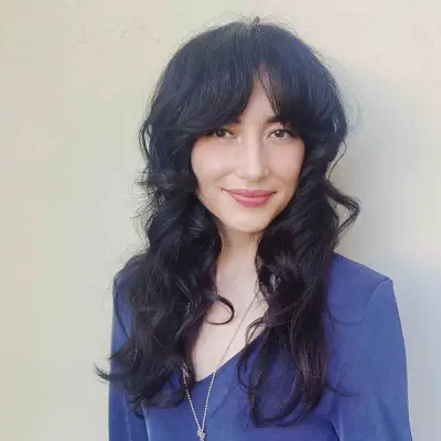 Long Wavy Hair with Bottleneck Feathered Bangs