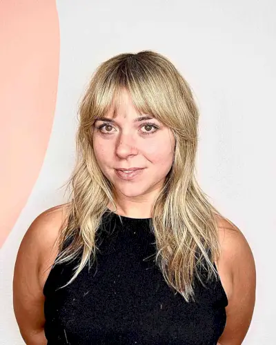 Mid-Length Beach Blonde Shaggy Hair with French Fringe