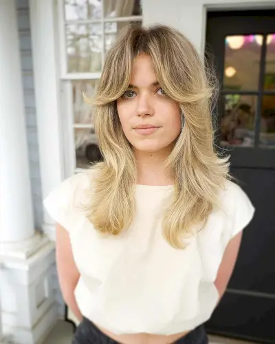 Gorgeous long curtain bangs on mid-length hair