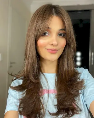 Chic Long hair with a middle part and curtain bangs