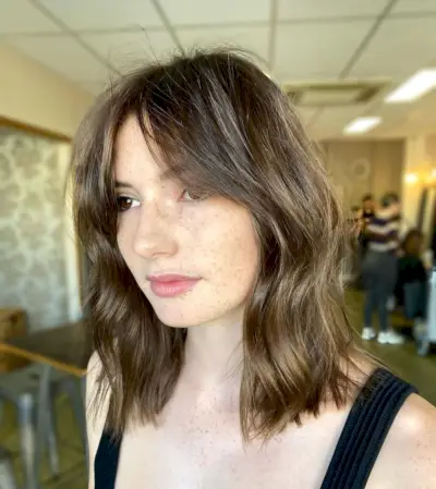 Alluring Long Curtain fringe on a long bob