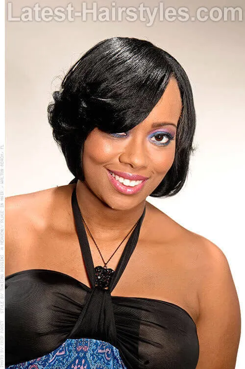 första dam sofistikerad bob frisyr för svarta tjejer' title=