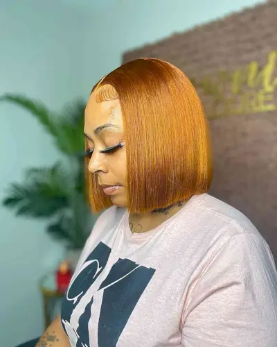 short bob hairstyle for black woman with round face