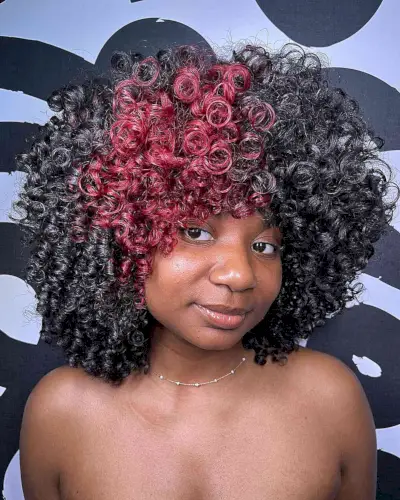 Thick Curls with a Pop of Color for African-American Ladies with long thick curly hair