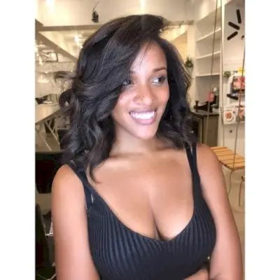 Picture of a black girl with deep part waves