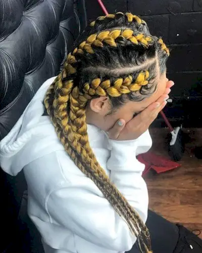 yellow and black colored box braids
