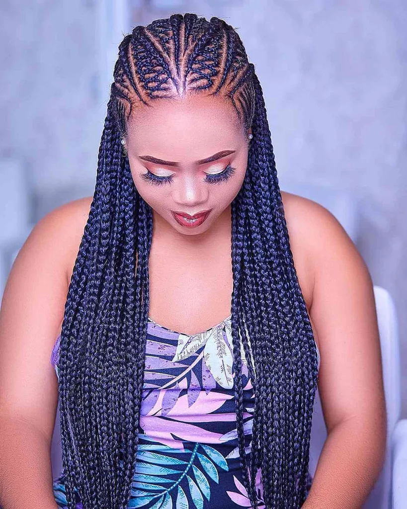 Ochronne seksowne plemienne Cornrows' title=