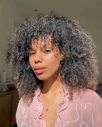 Natural Layered Kinky Hair with Blonde Accents