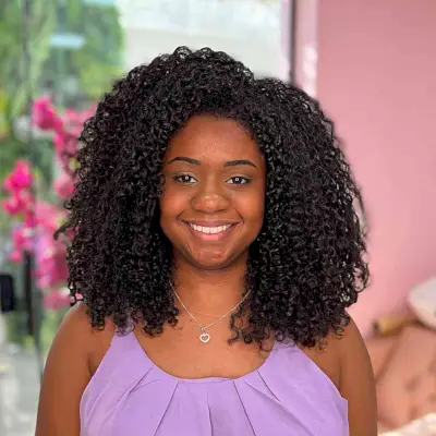 Side Part Style on Shoulder-Length Black Natural Curly Hair