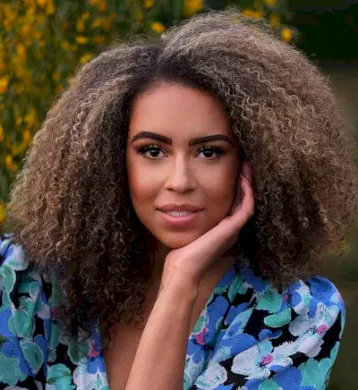 Natural Big Fluffy Afro with an Off-Center Part