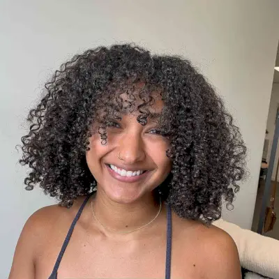 Curly Bangs for Black Women with Shoulder-Length Hair