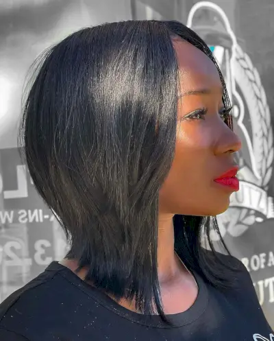 full sew in with a middle part