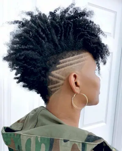 Short afro mohawk with designs