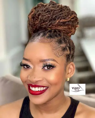 Faux Locs Knotless Box Braids in a Top Bun for Black Ladies