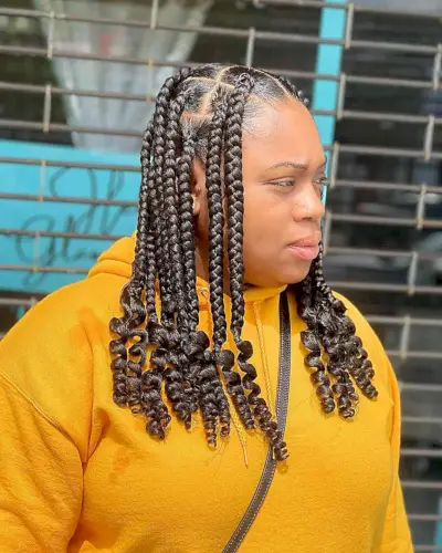 Medium-Length Jumbo Knotless Braids with Sleek Curled Ends