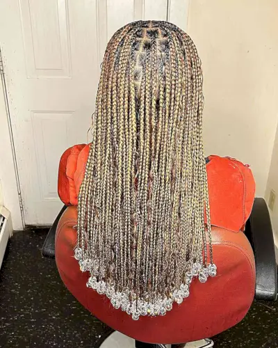 Long Knotless Blonde Beaded Braids with Wavy Strands