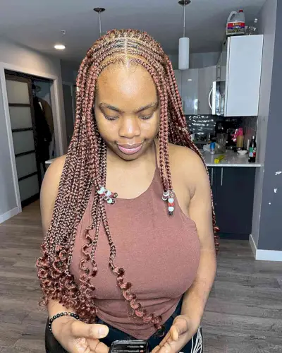 Waist-Length Middle Part Ginger Knotless Braids Cornrows with Curled Ends and Beads