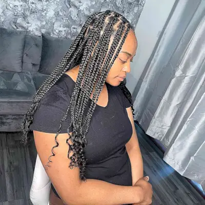 Medium-Length Knotless Braids with Cascading Curls