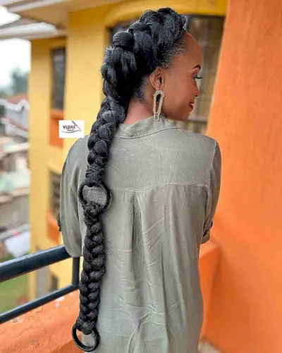Sleek but Loosely Braided Ponytail for Black Women
