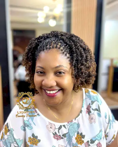 Short Natural Cornrows and Passion Twists for black women with prominent cheeks