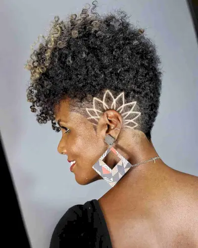 Natural Afro with Shaved Side Designs