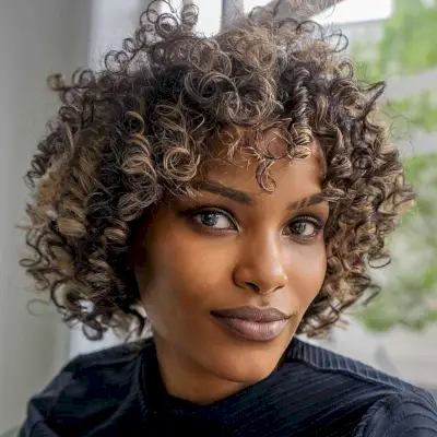 jaw-length bob hairstyle for natural curls