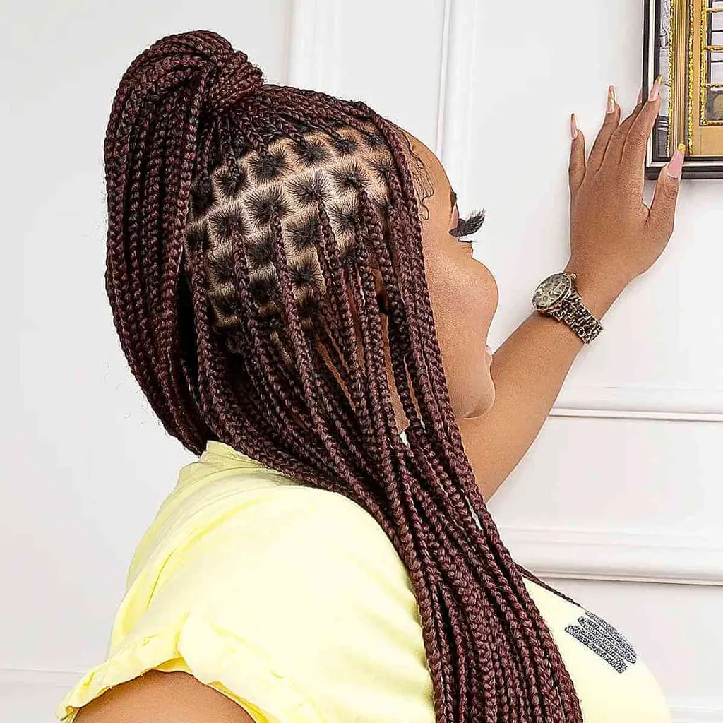 40 lange Box-Zöpfe sind laut Flechter derzeit im Trend' title=