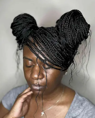 Side-Swept Braided Updo with Space Buns