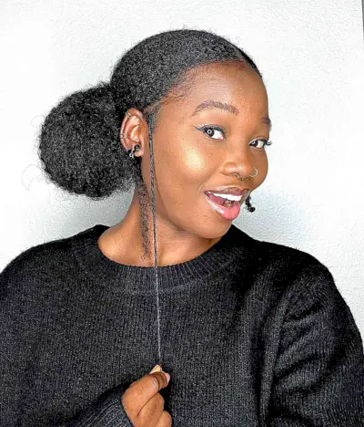 Low Bun Updo Style with Middle Part for Young Black Ladies
