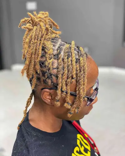 Medium Blonde Twists and Dreadlocks Updo with Side Bangs for Black Women