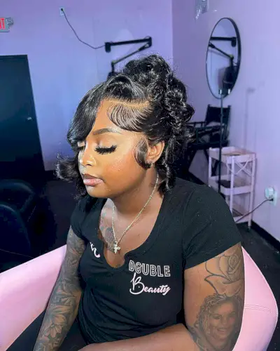 Curled Weave Updo with Side-Swept Hair for Black Women