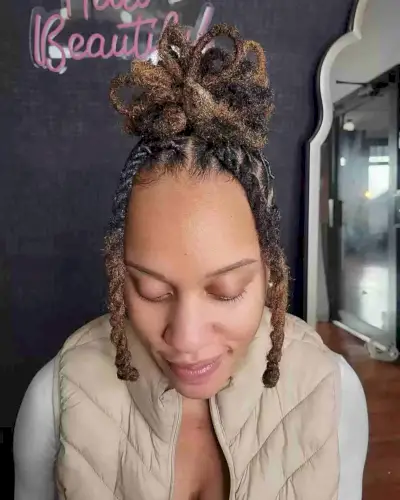 Petal Bun Updo with Two Strand Twists for Black Women