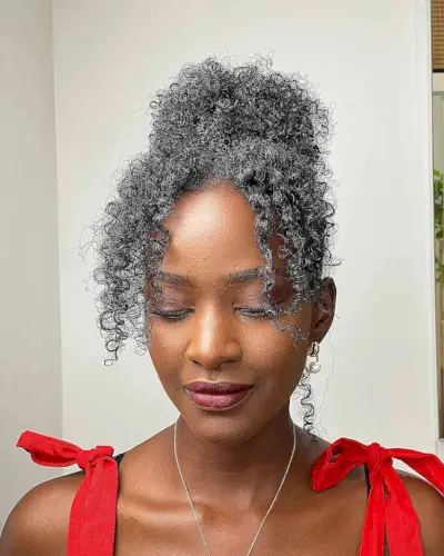 High Bun Updo with Curly Curtain Bangs for Black Women