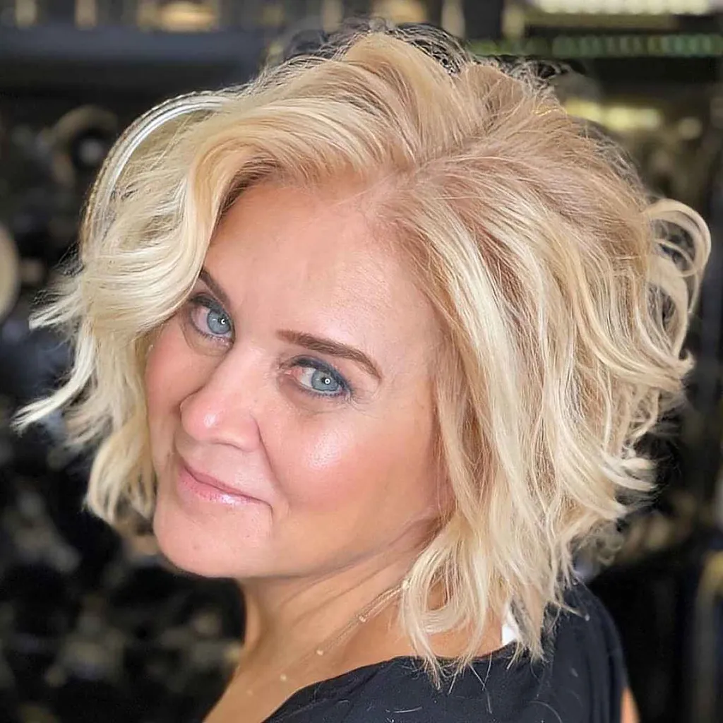 a-line solkyssade blonda strandvågor' title=