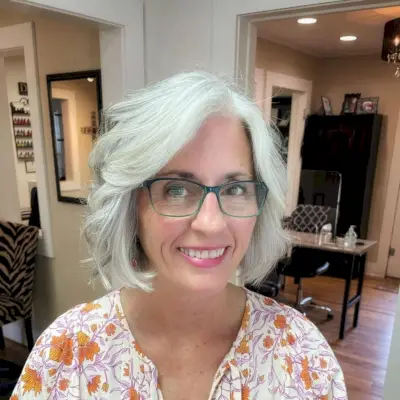 Short silver blonde bob for older women