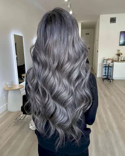 Sexy Metallic Silver Blonde Hair color on long wavy hair
