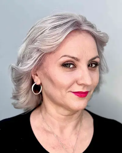 Silverish Blonde Bob for Old Ladies with strong facial features and mid-length hair