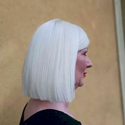 Above-the-Shoulder White Blonde Bob for ladies with straight hair