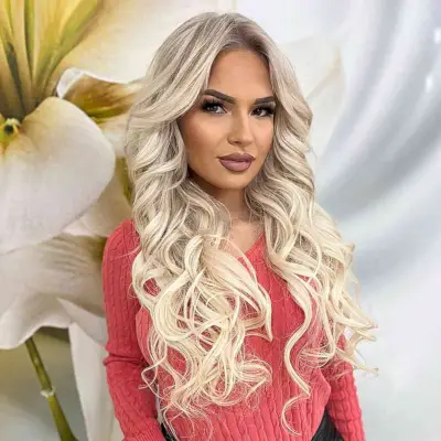 Jaw-Dropping White Blonde Long Hair with curled ends and a center part