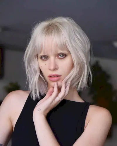 Romantic platinum blonde blunt cut