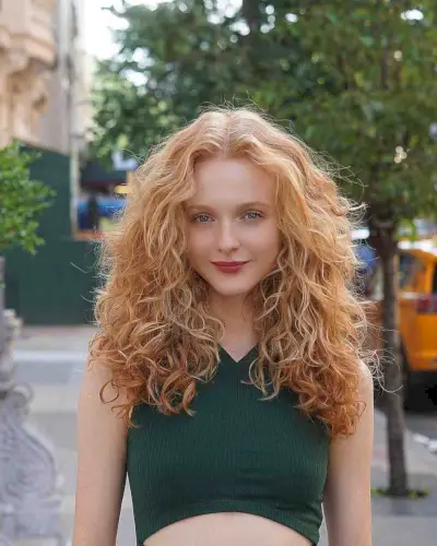 Medium Layered Curly Strawberry Blonde Hair