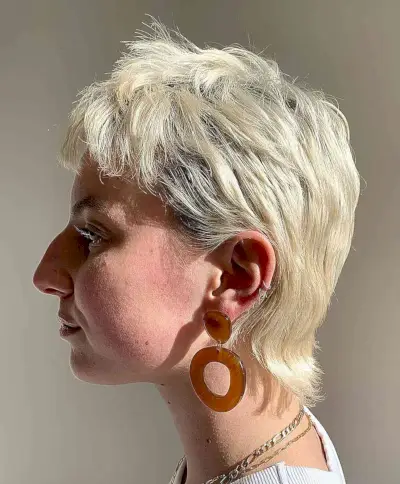 Soft Pixie Mullet with Jagged Layers on Bleach Blonde with Dark Roots
