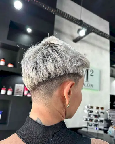 Platinum Edgy Pixie with Disconnected Shaved Sides and Nape on Darker Base